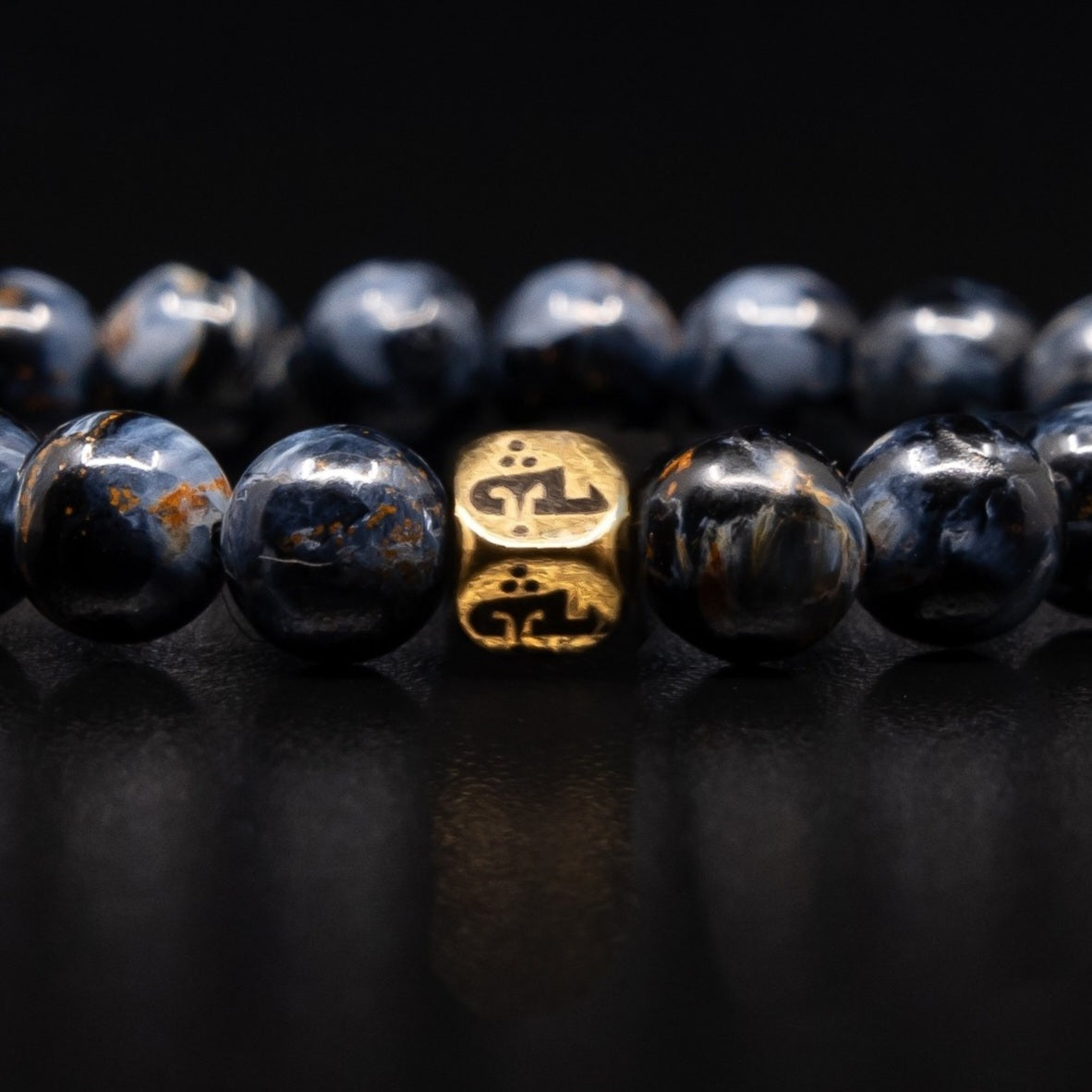 PIETERSITE BRACELET WITH GOLD TRINITY BEAD